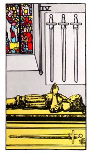 The Four of Swords meaning for upright and reversed positions using the Rider-Waite tarot deck.