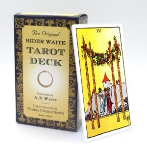 Four of Wands meaning for upright and reversed positions using the Rider-Waite tarot deck.