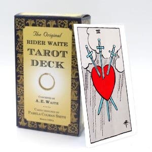 Three of Swords meaning for upright and reversed positions using the Rider-Waite tarot deck.